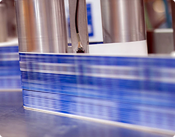 Blue-striped paper on machine
