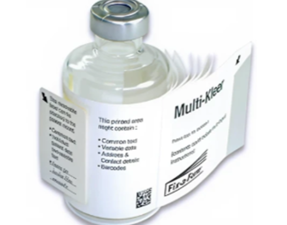 Clear glass vial labeled Multi-Klear